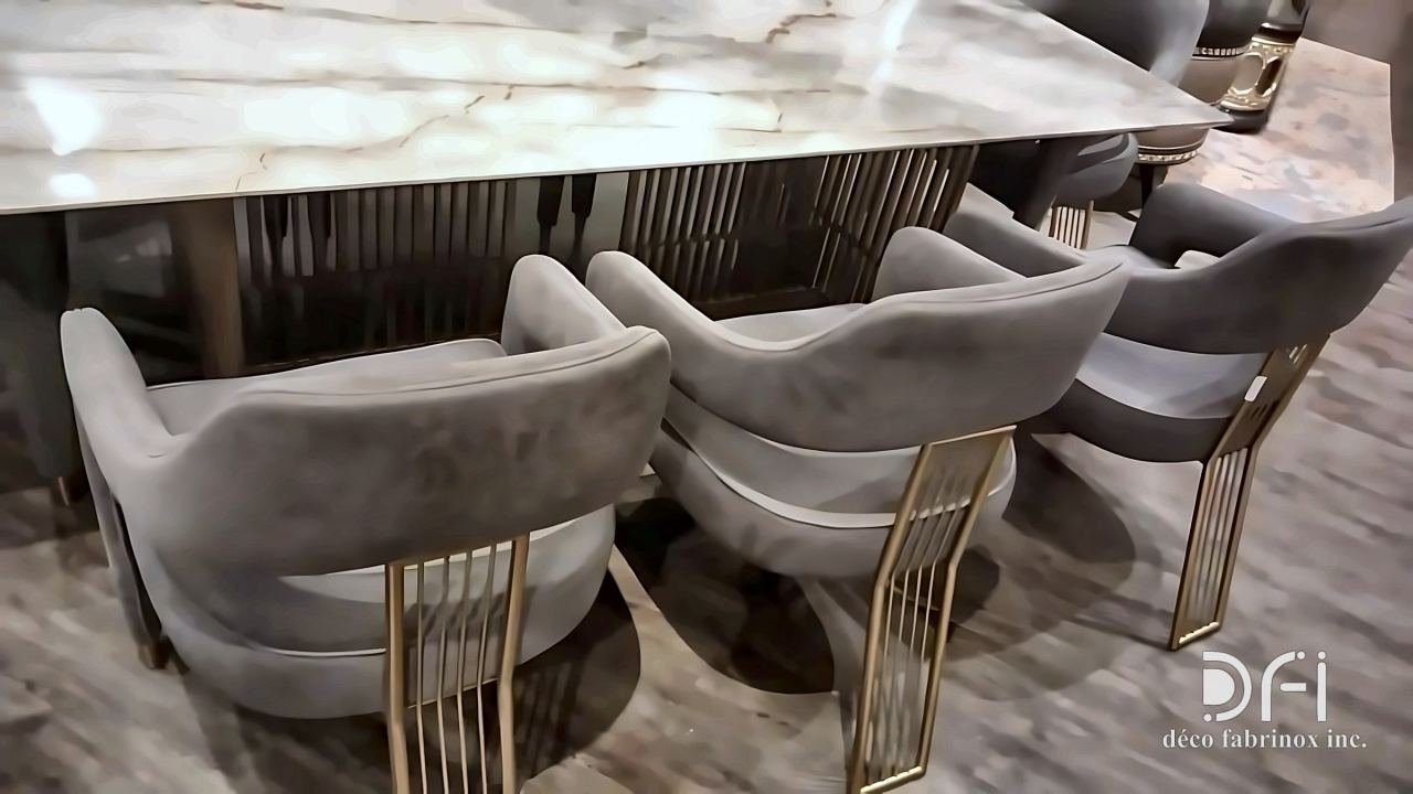 Dining chairs with brass rod backs at a marble table