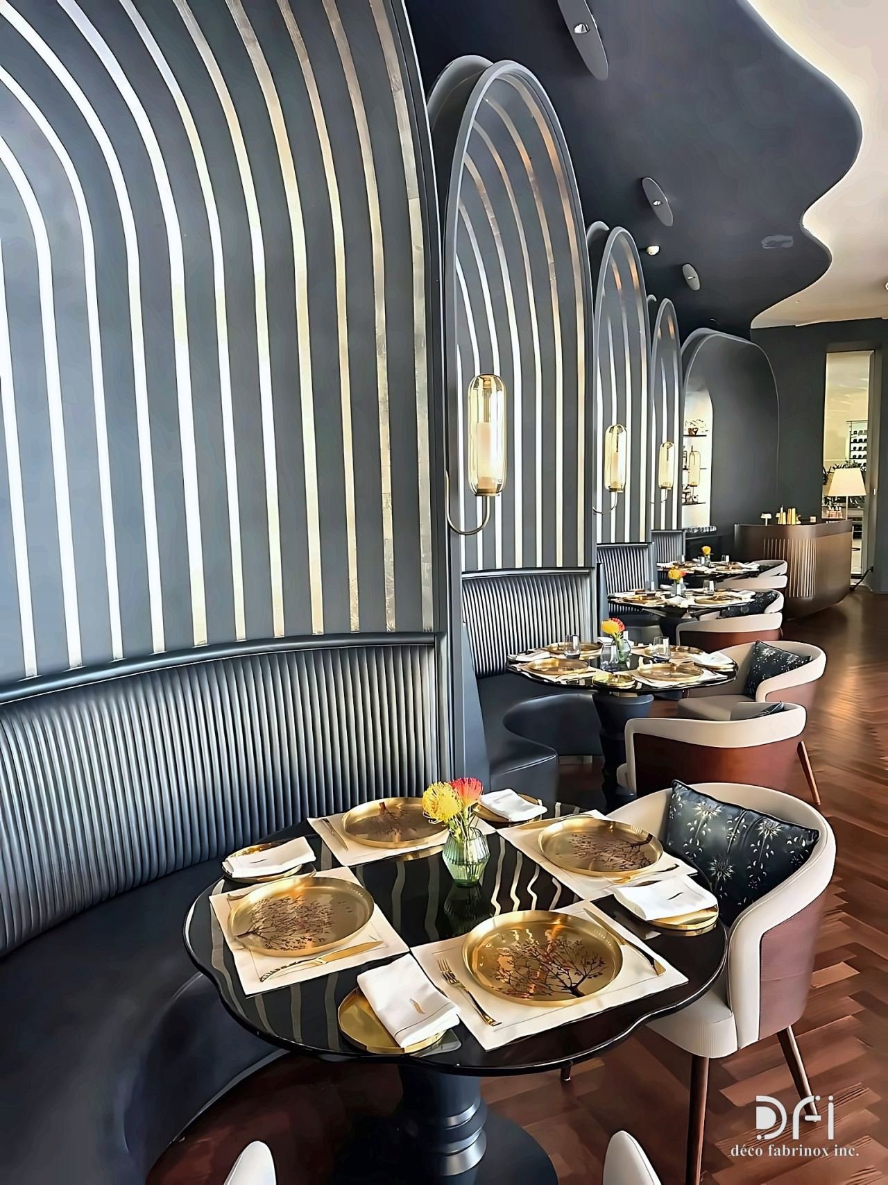 Fluted metal arches framing booth seating in a restaurant