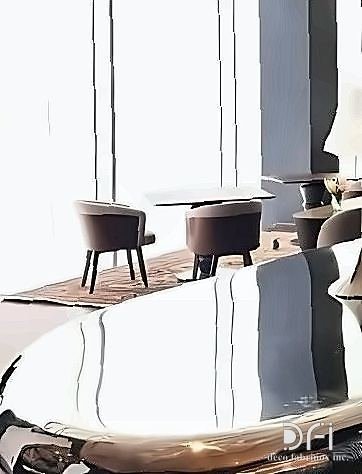 Close view of a mirror-polished stainless steel table edge